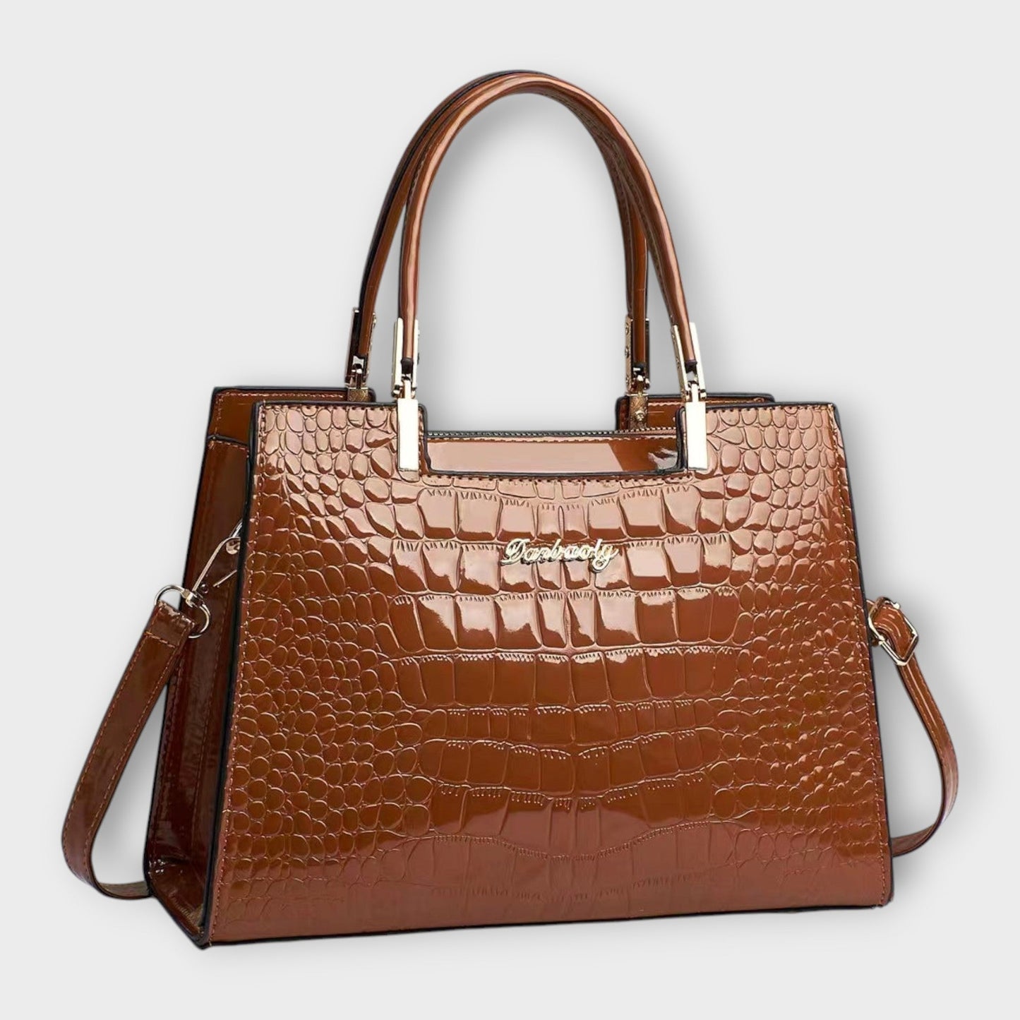 Bolso de mano brillante con estampado de piel de cocodrilo de Laura