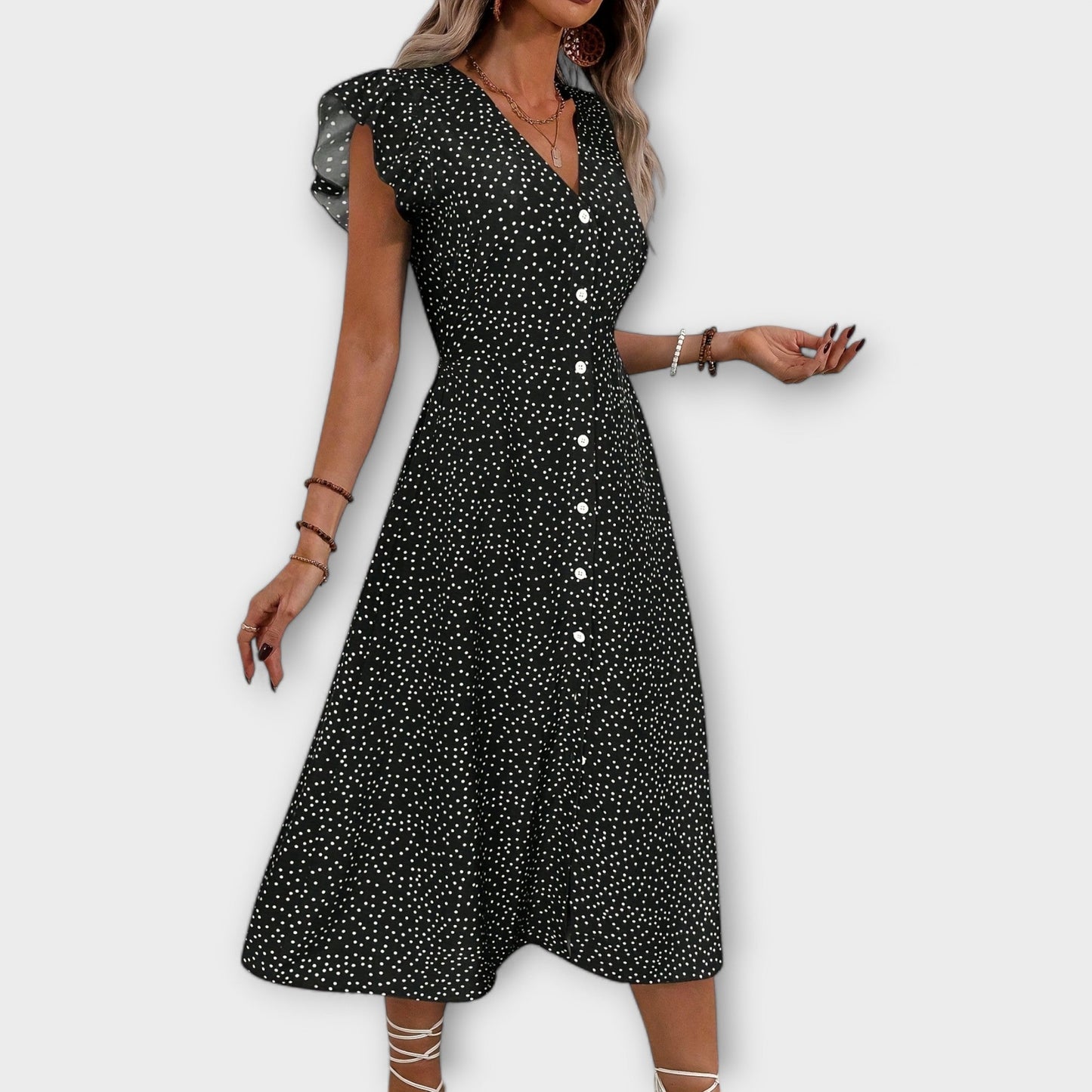 Vestido midi elegante con puntos de lunares