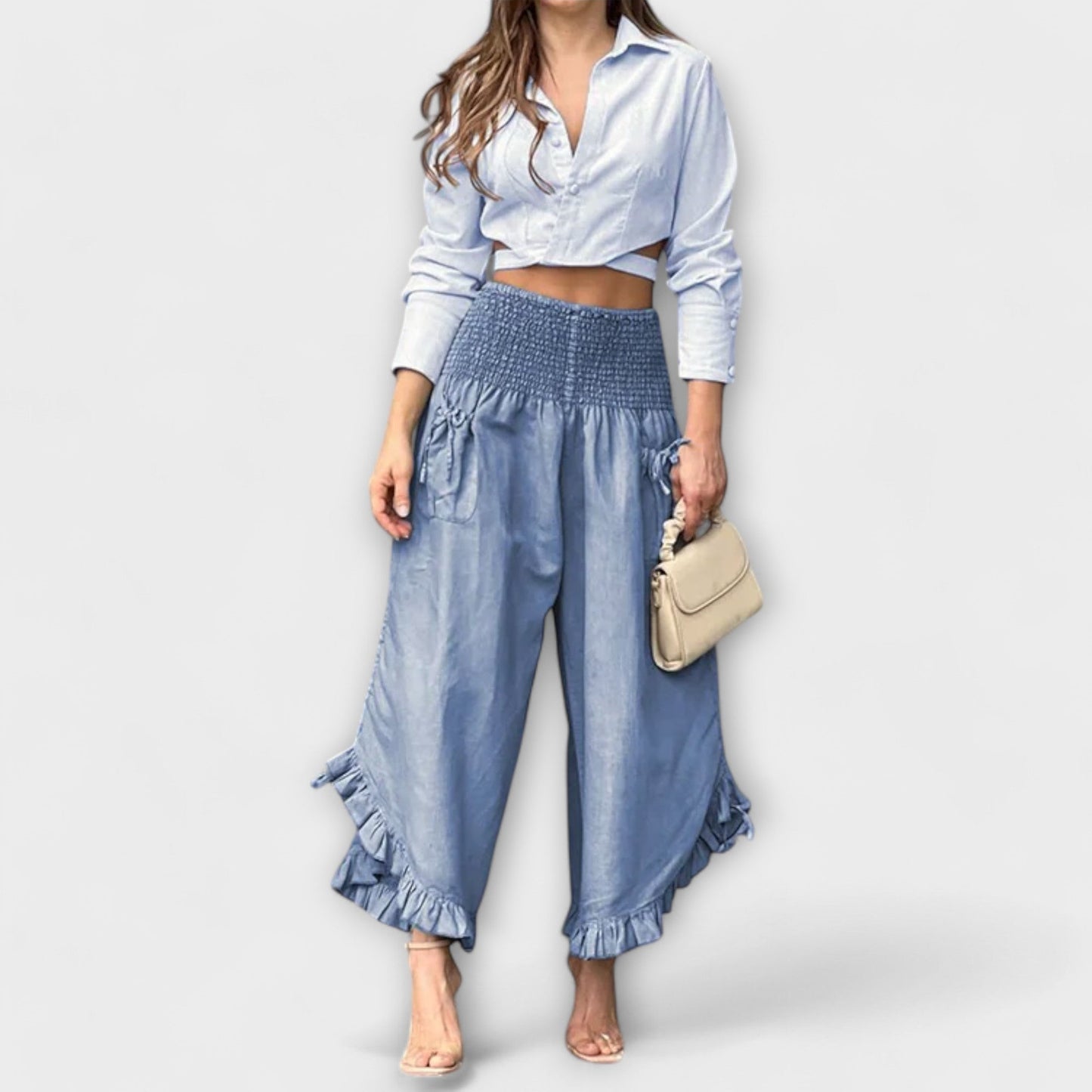 Pantalones de lino holgados con pliegues de moda