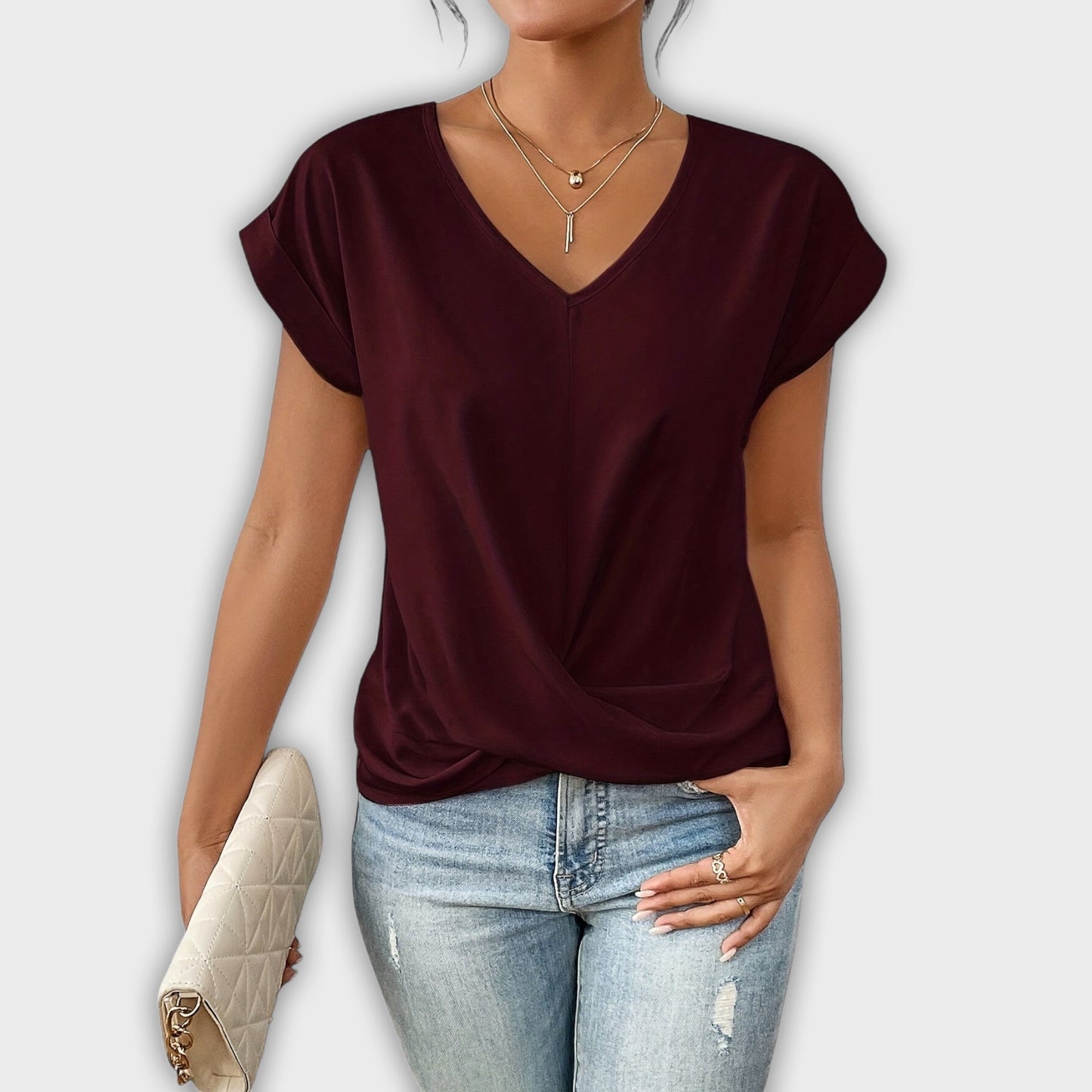 Top con escote en V y detalle de nudo