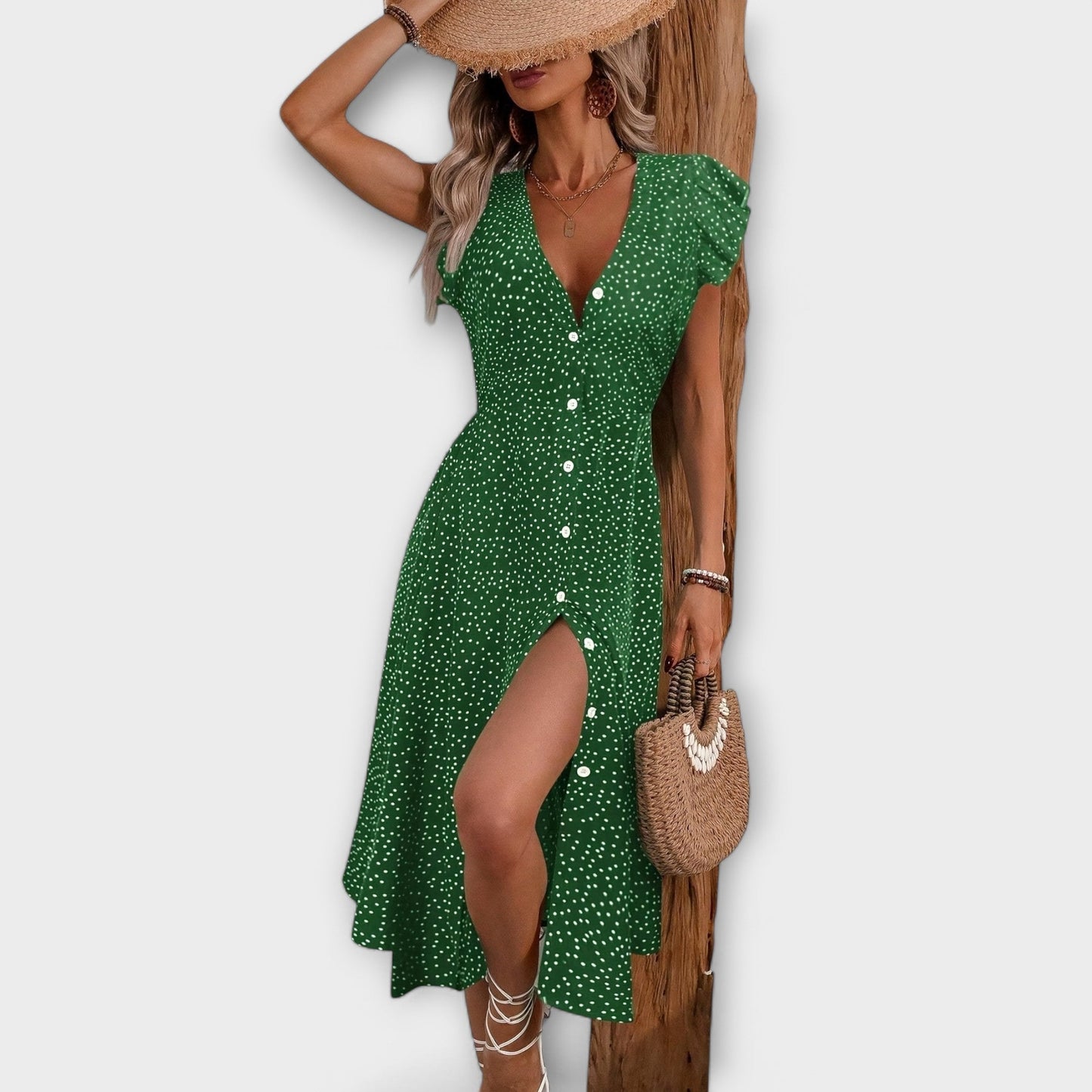 Vestido midi elegante con puntos de lunares