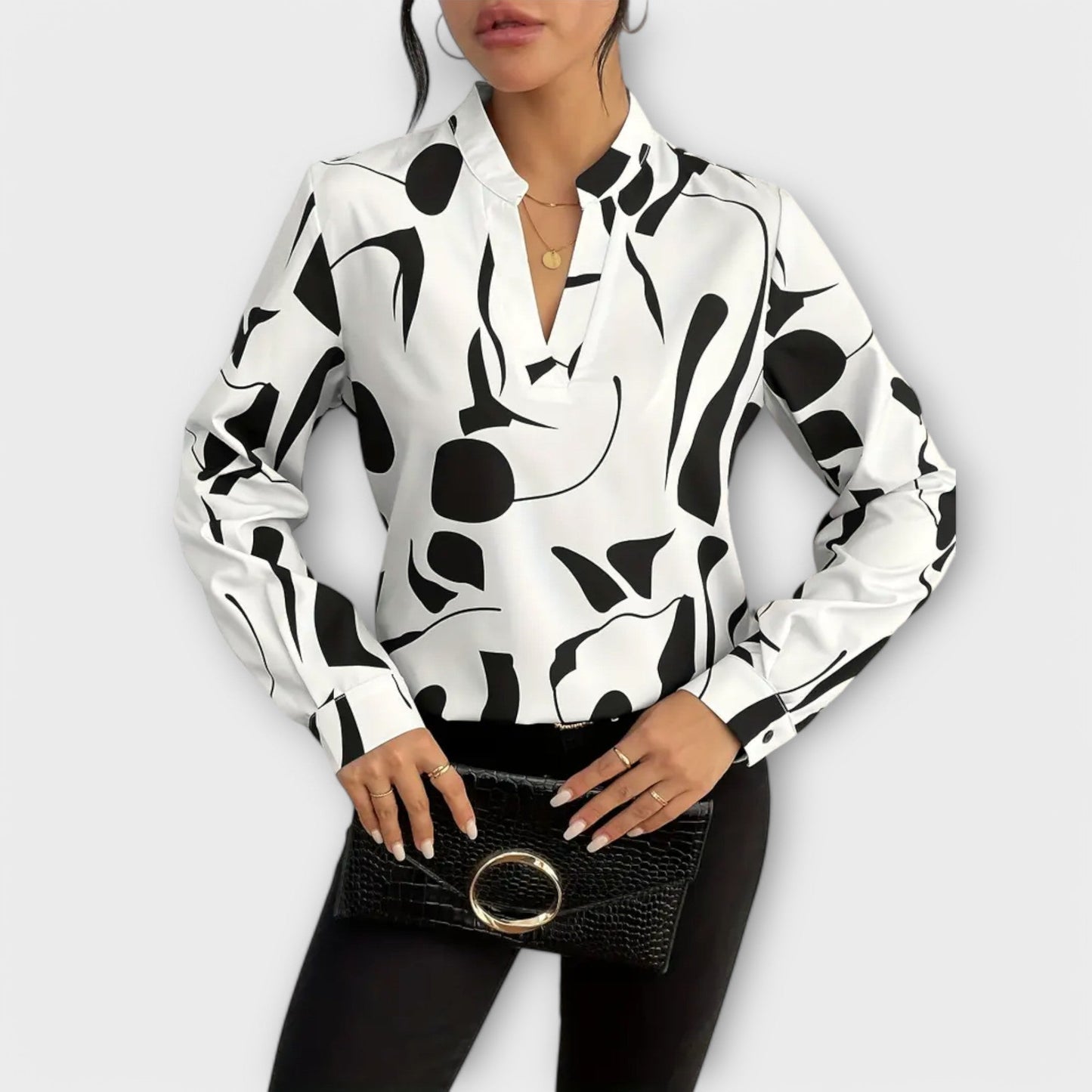 Camisa de manga larga con forma de V elegante y patrón geométrico