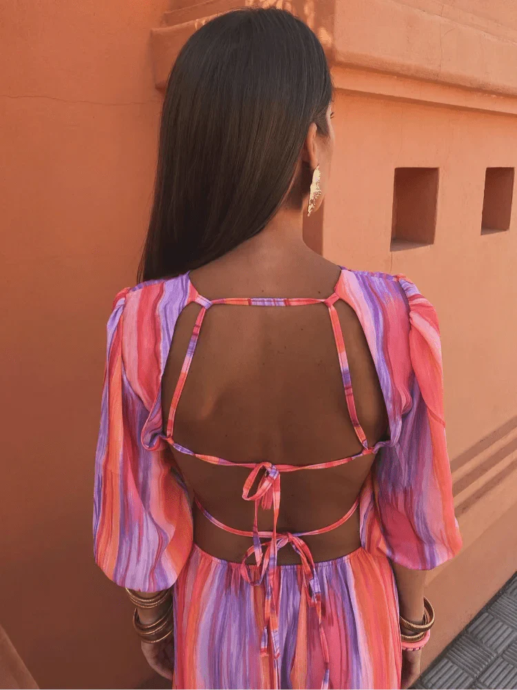 Pluma | Vestido elegante con cortes