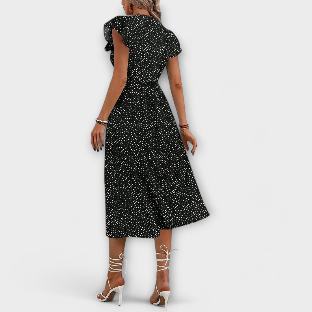 Vestido midi elegante con puntos de lunares