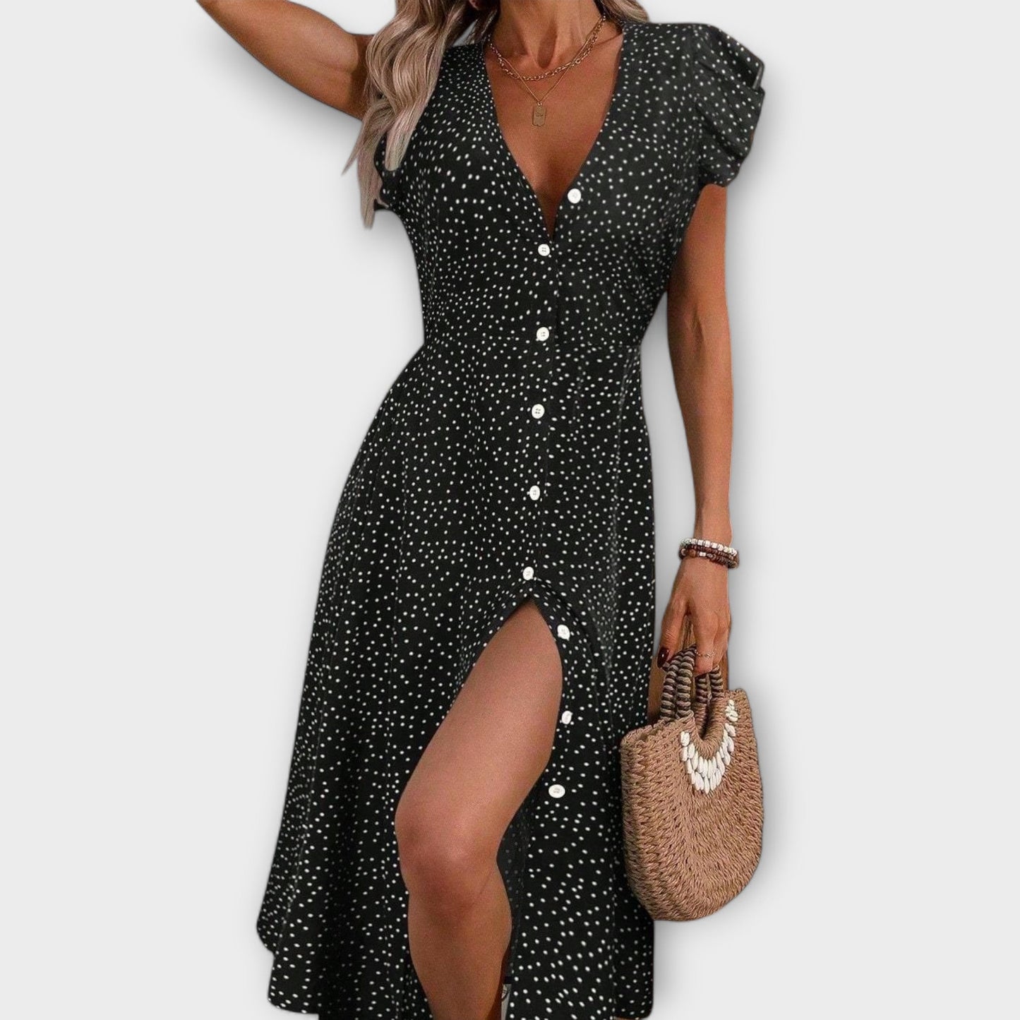 Vestido midi elegante con puntos de lunares
