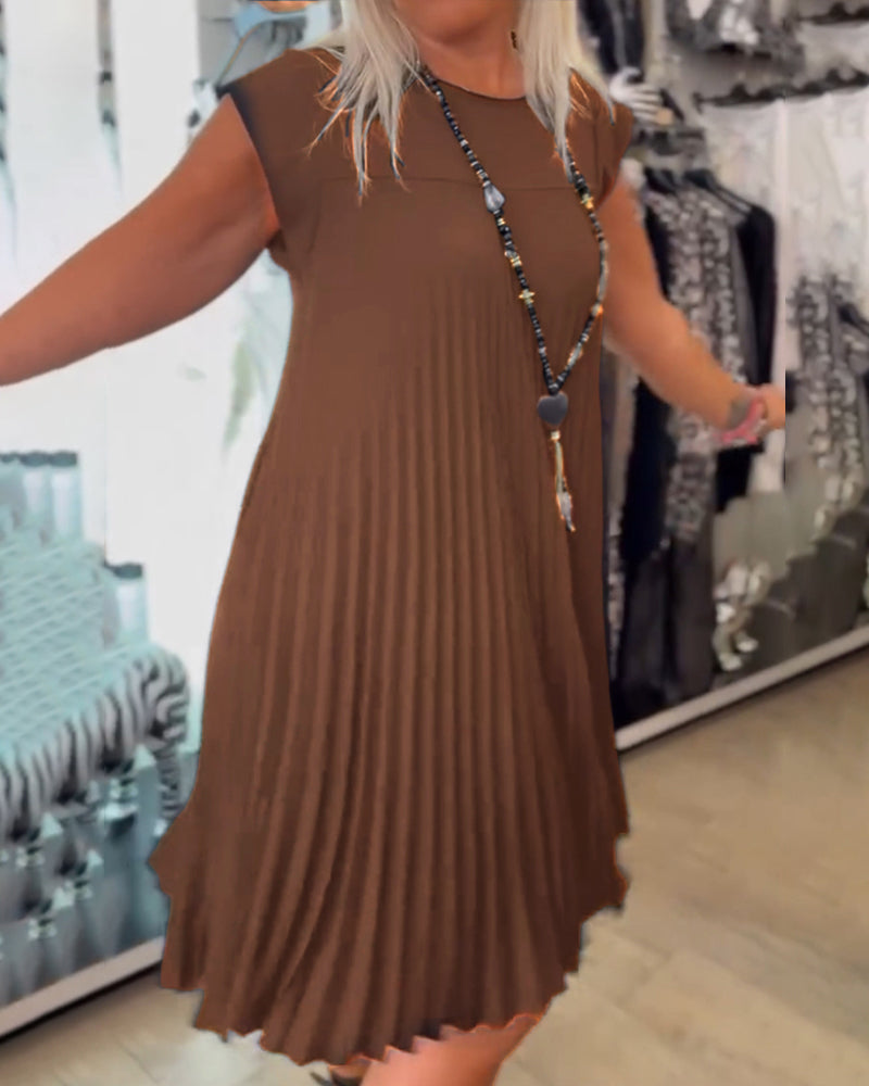 Clara | Vestido de verano plisado y sencillo.