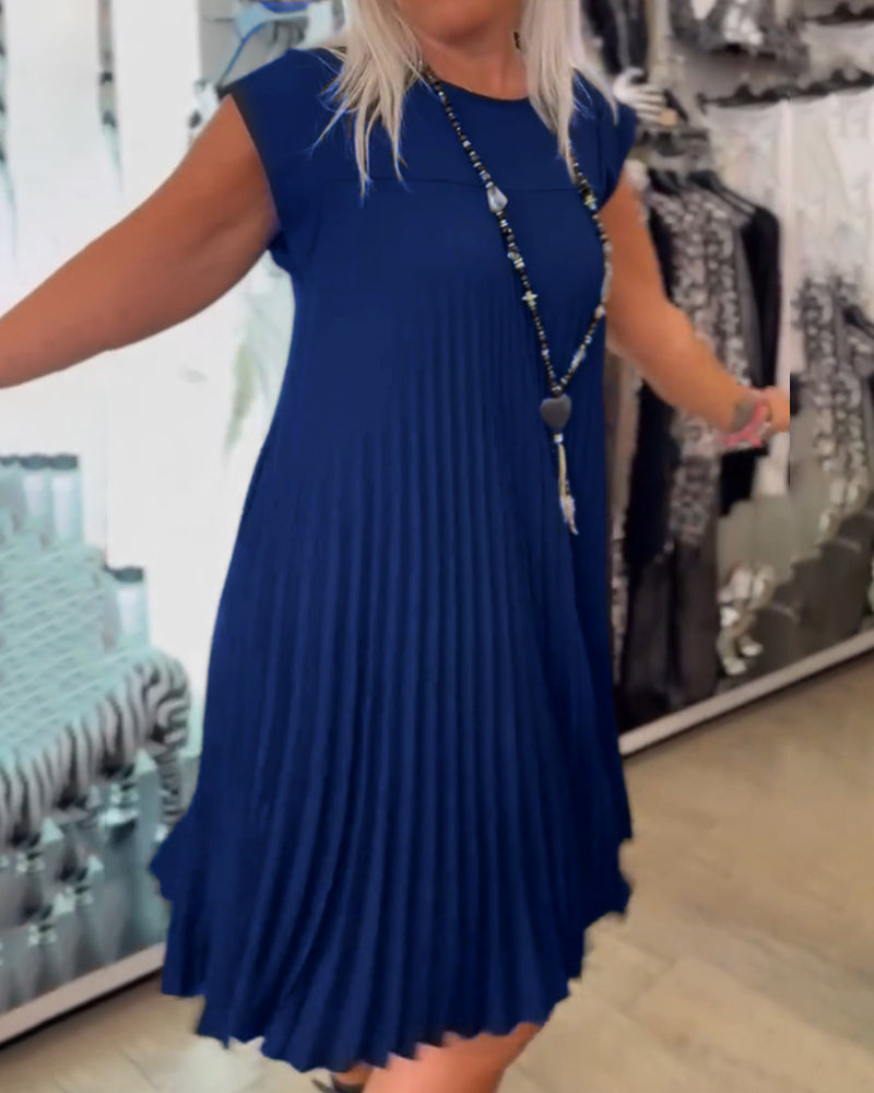 Clara | Vestido de verano plisado y sencillo.