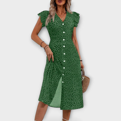 Vestido midi elegante con puntos de lunares