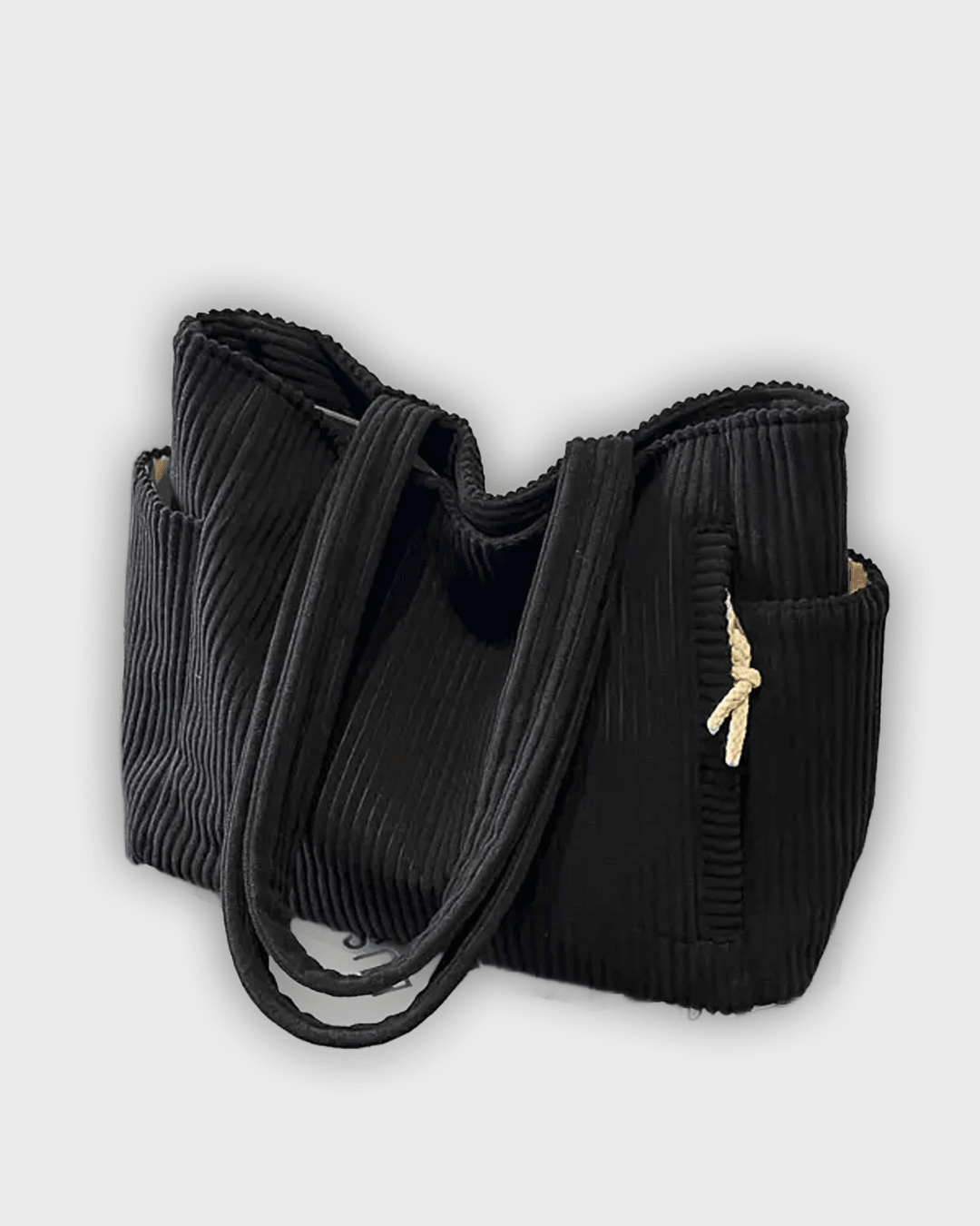 Bolso de mano con detalles de hilo