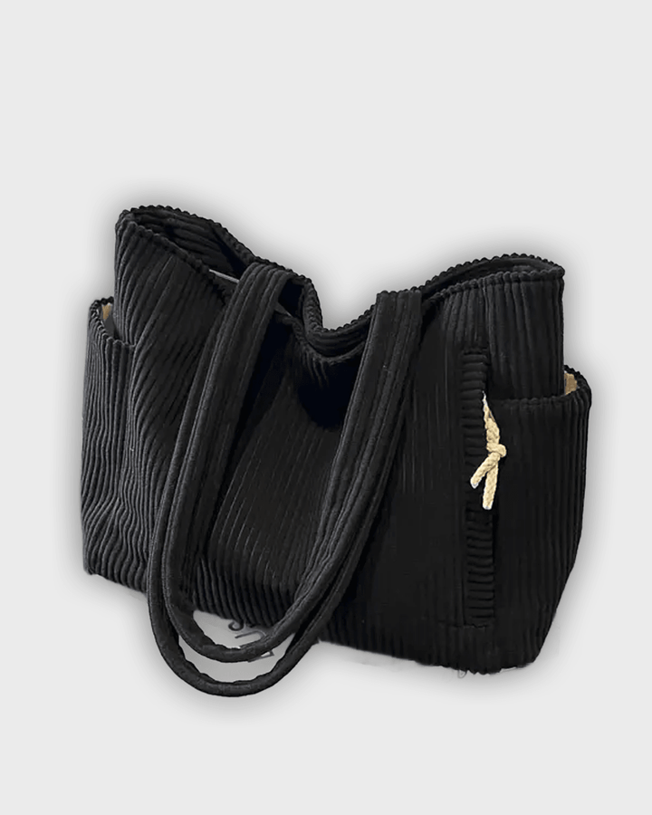 Bolso de mano con detalles de hilo