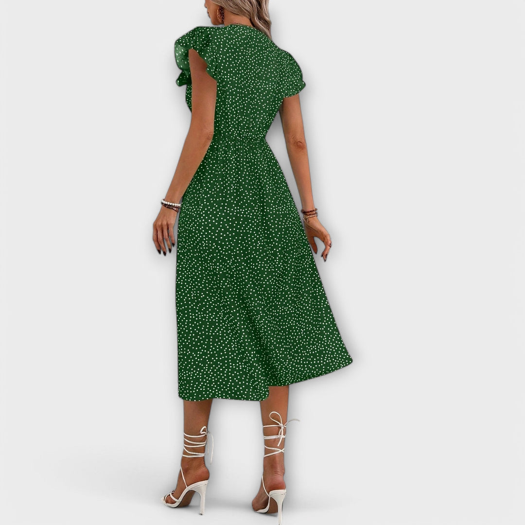 Vestido midi elegante con puntos de lunares
