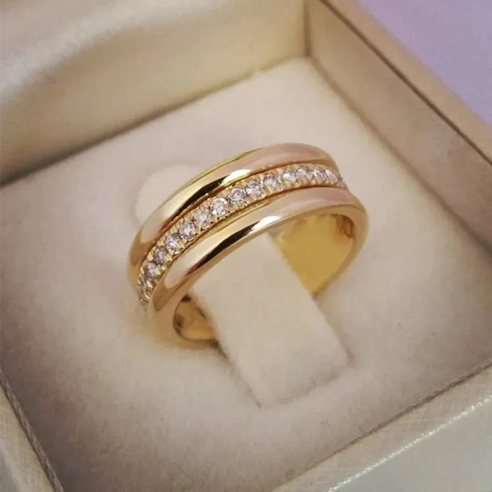 Anillo doble elegante con piedras de circonio