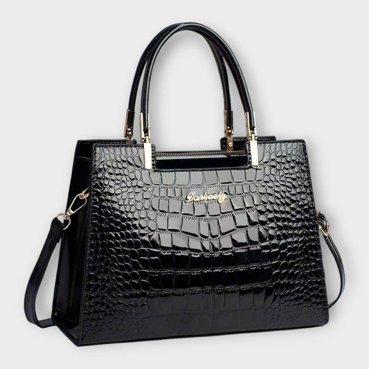 Bolso de mano brillante con estampado de piel de cocodrilo de Laura