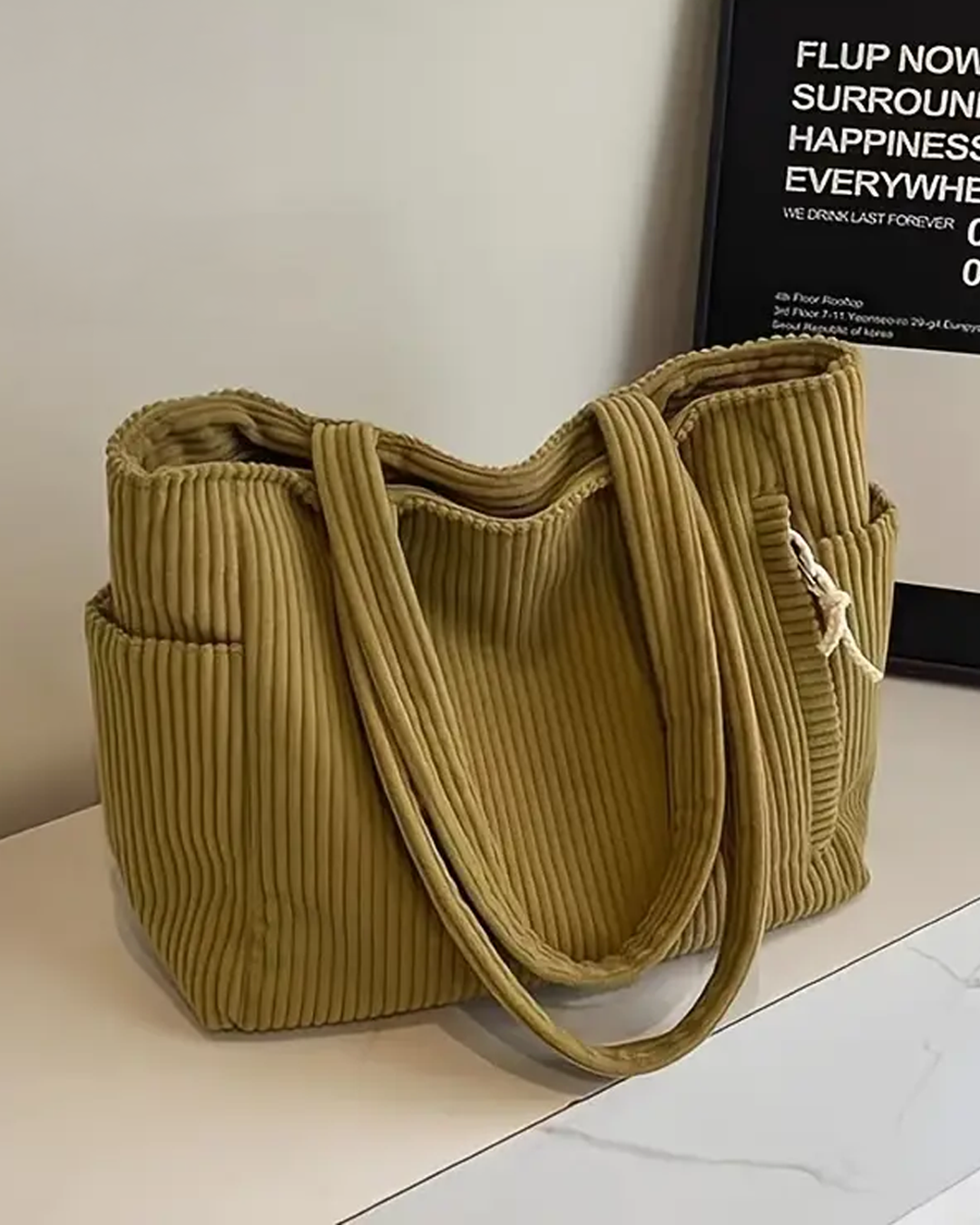 Tilda – Bolsa de transporte con detalles de hilo