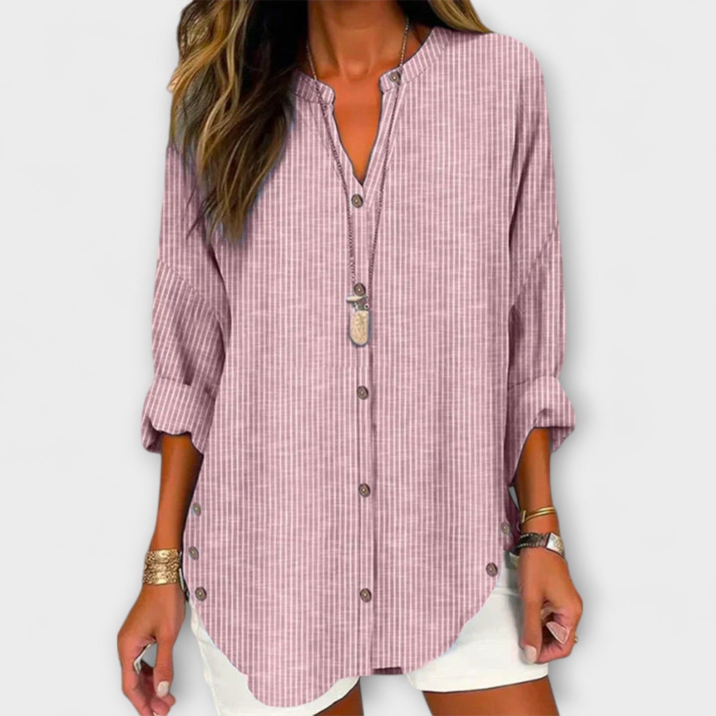 Top Lucida con cuello en V y elegante diseño de rayas
