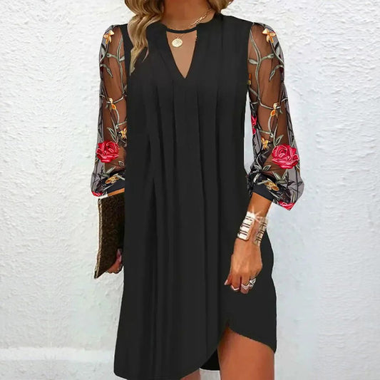 Rena™ | Vestido mini elegante con cuello en V y mangas transparentes