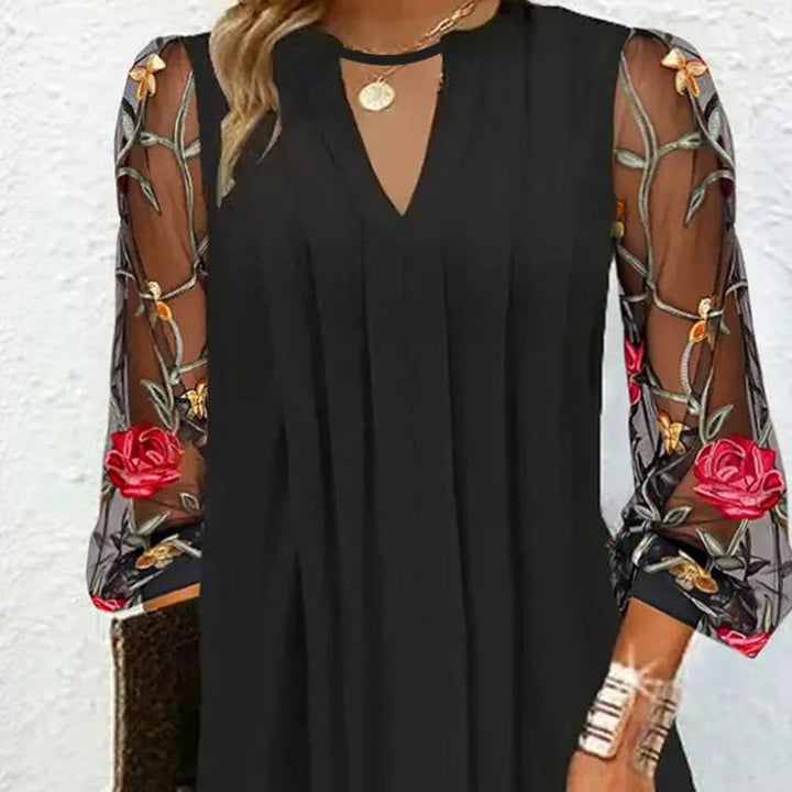 Rena™ | Vestido mini elegante con cuello en V y mangas transparentes