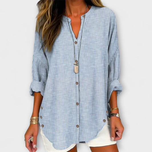 Top Lucida con cuello en V y elegante diseño de rayas
