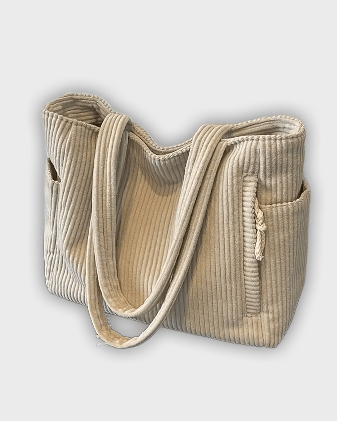 Bolso de mano con detalles de hilo