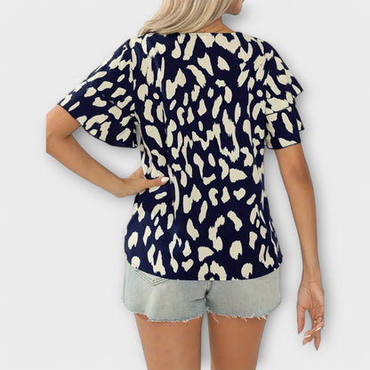 Camiseta Abuline de cuello redondo para mujeres con estampado de leopardo