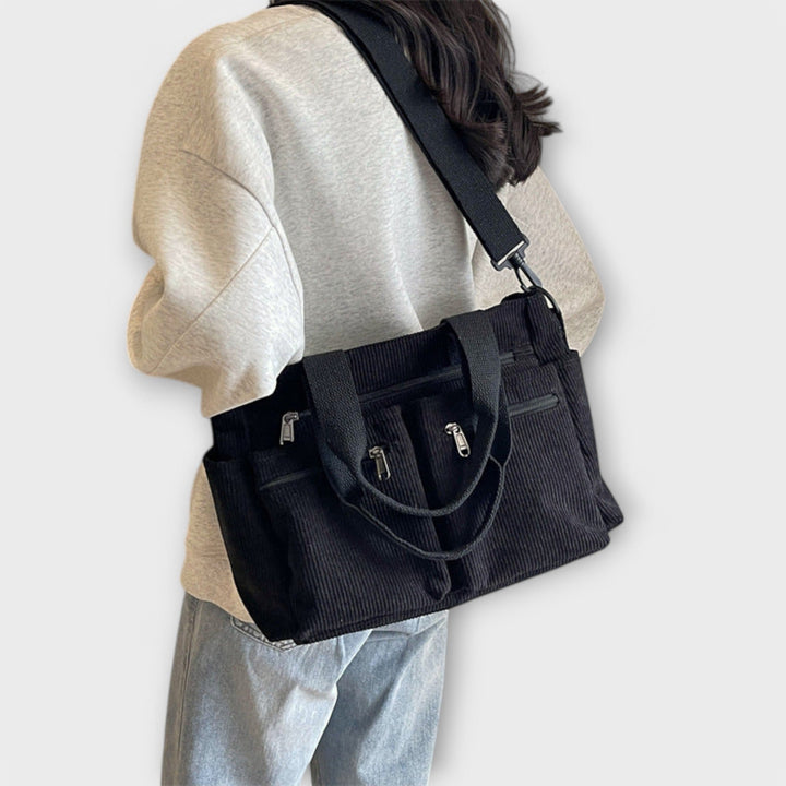 Bolso tote impermeable con compartimento interno espacioso