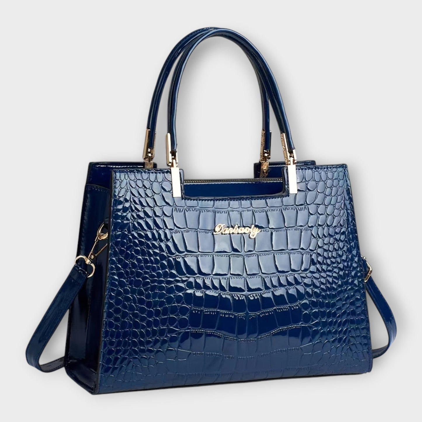 Bolso de mano brillante con estampado de piel de cocodrilo de Laura