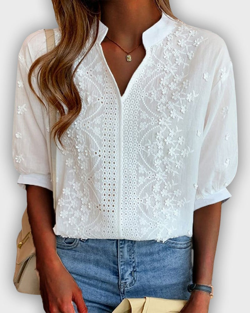 Blusa de vestir con mangas abullonadas y cuello en V de encaje