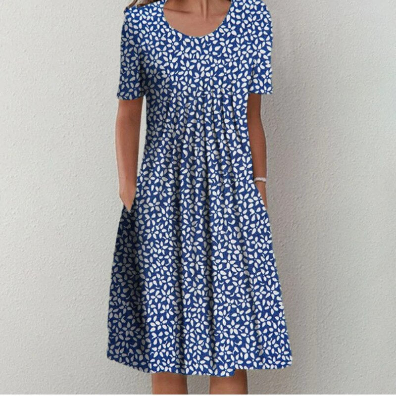 Amalia – Vestido elegante con capas