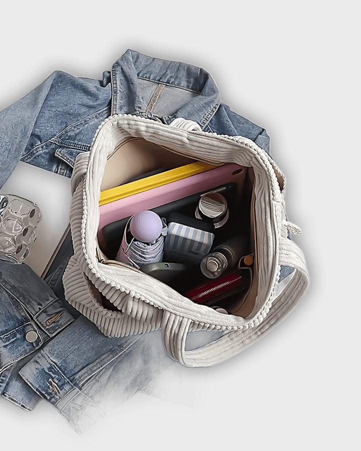 Bolso de mano con detalles de hilo