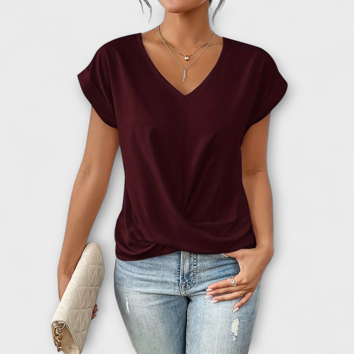 Top V con detalles de botón