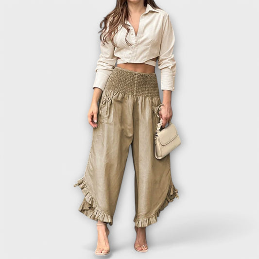 Pantalones de lino holgados con pliegues de moda