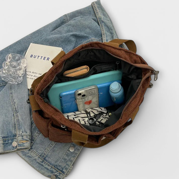 Bolso tote impermeable con compartimento interno espacioso