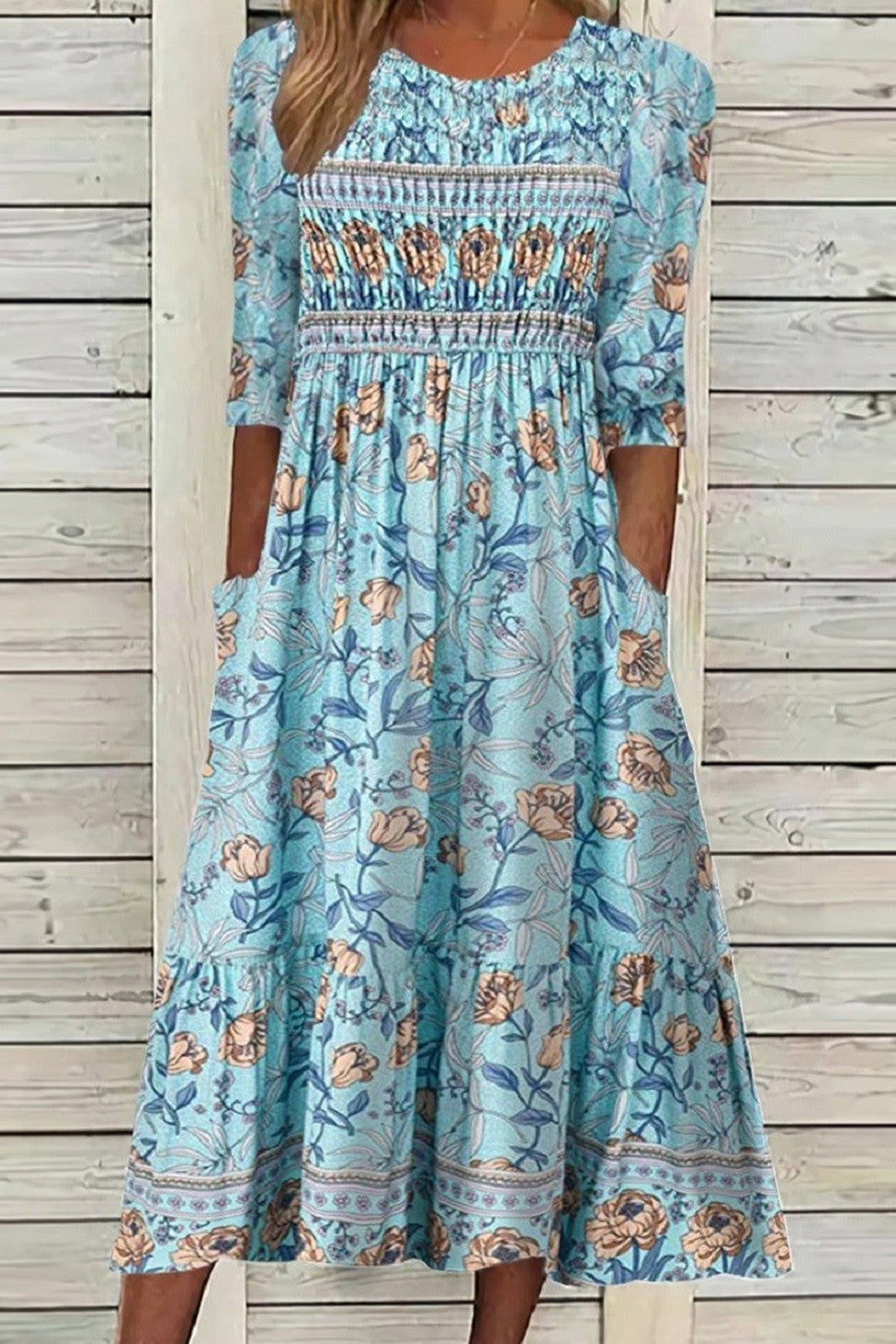 Darcie | Vestido fluido de pétalos con cobertura elegante para el abdomen