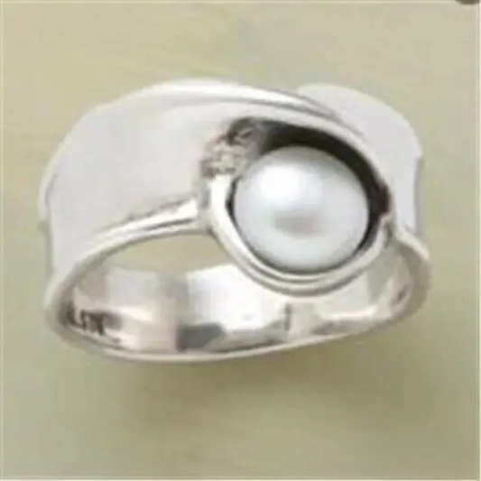 Anillo de perla retro de lujo