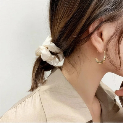 Pendientes de diseñador elegantes y de alta calidad