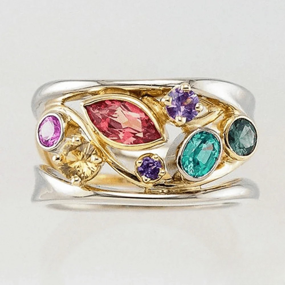 Anillo de plata vintage con oro y zirconia