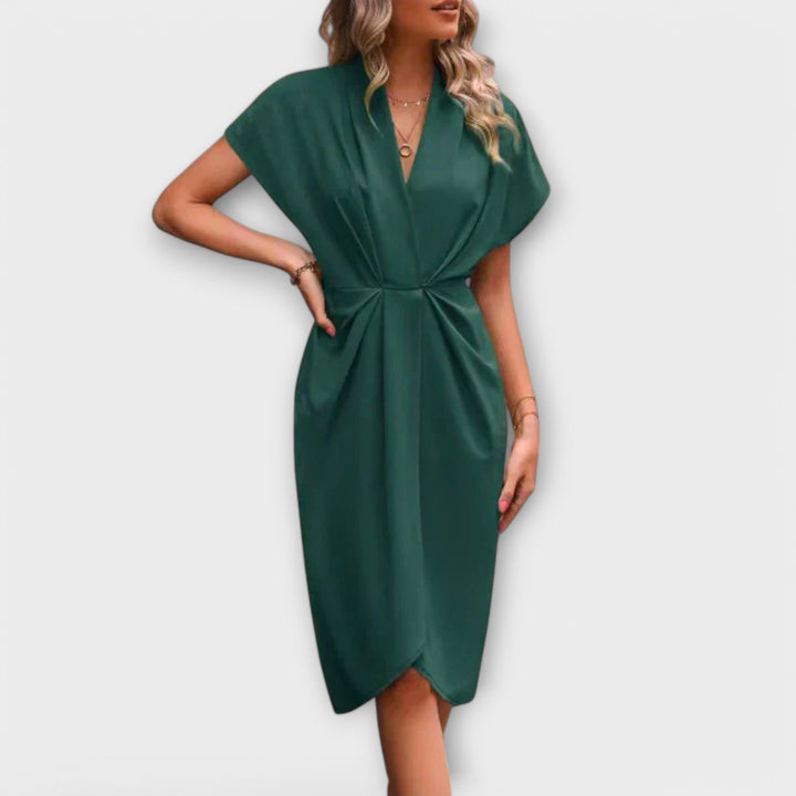 Vestido midi con lazo Sarna - Elegancia y comodidad