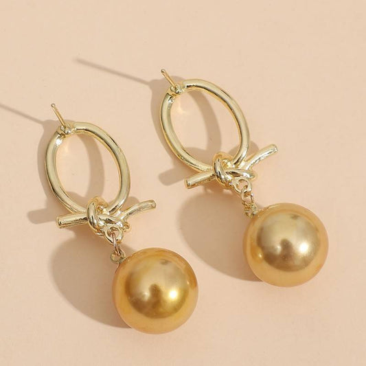 Pendientes de aro dorados con perlas - Joyas de Laura