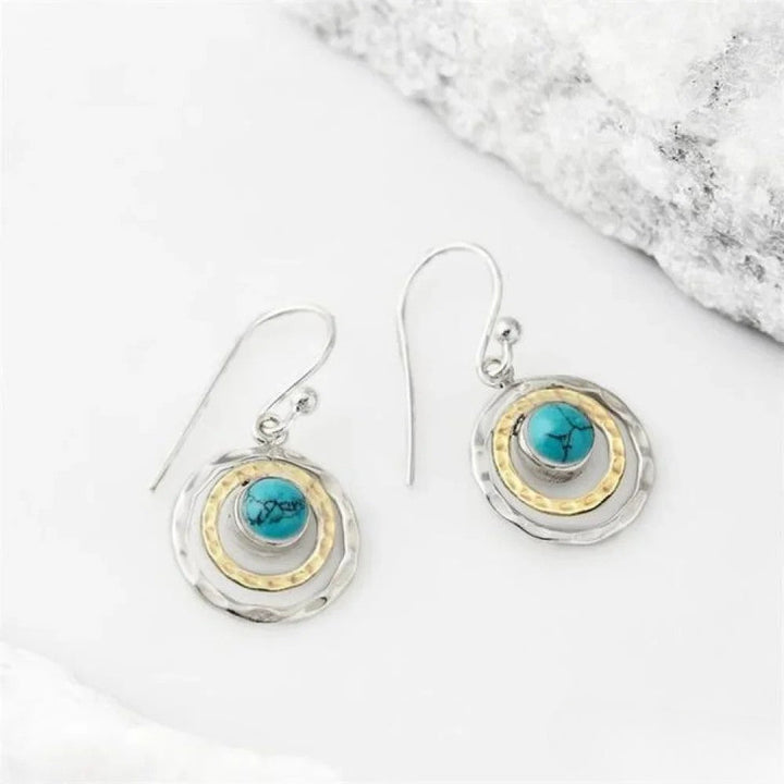 Pendientes Saturno Boho con piedra turquesa en plata y oro