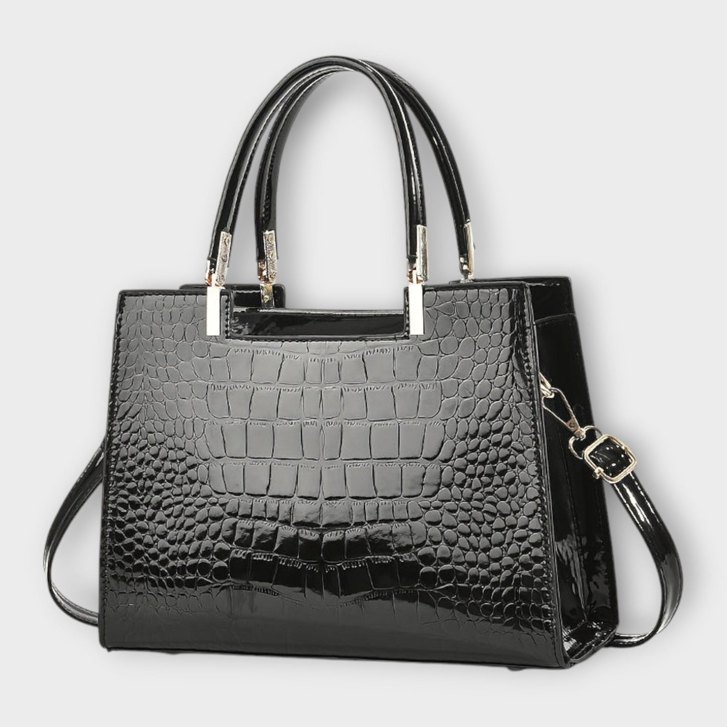 Bolso de mano brillante con estampado de piel de cocodrilo de Laura