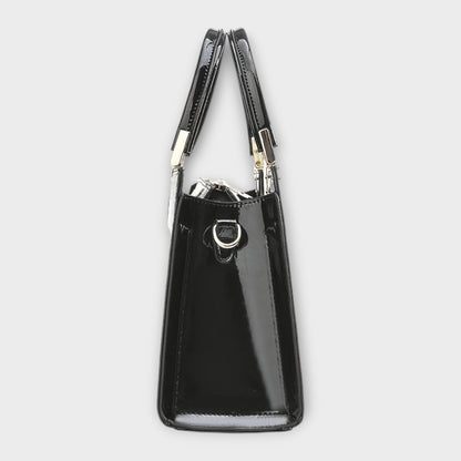 Bolso de mano brillante con estampado de piel de cocodrilo de Laura