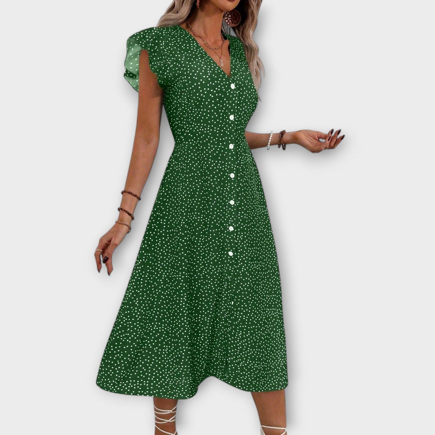 Vestido midi elegante con puntos de lunares