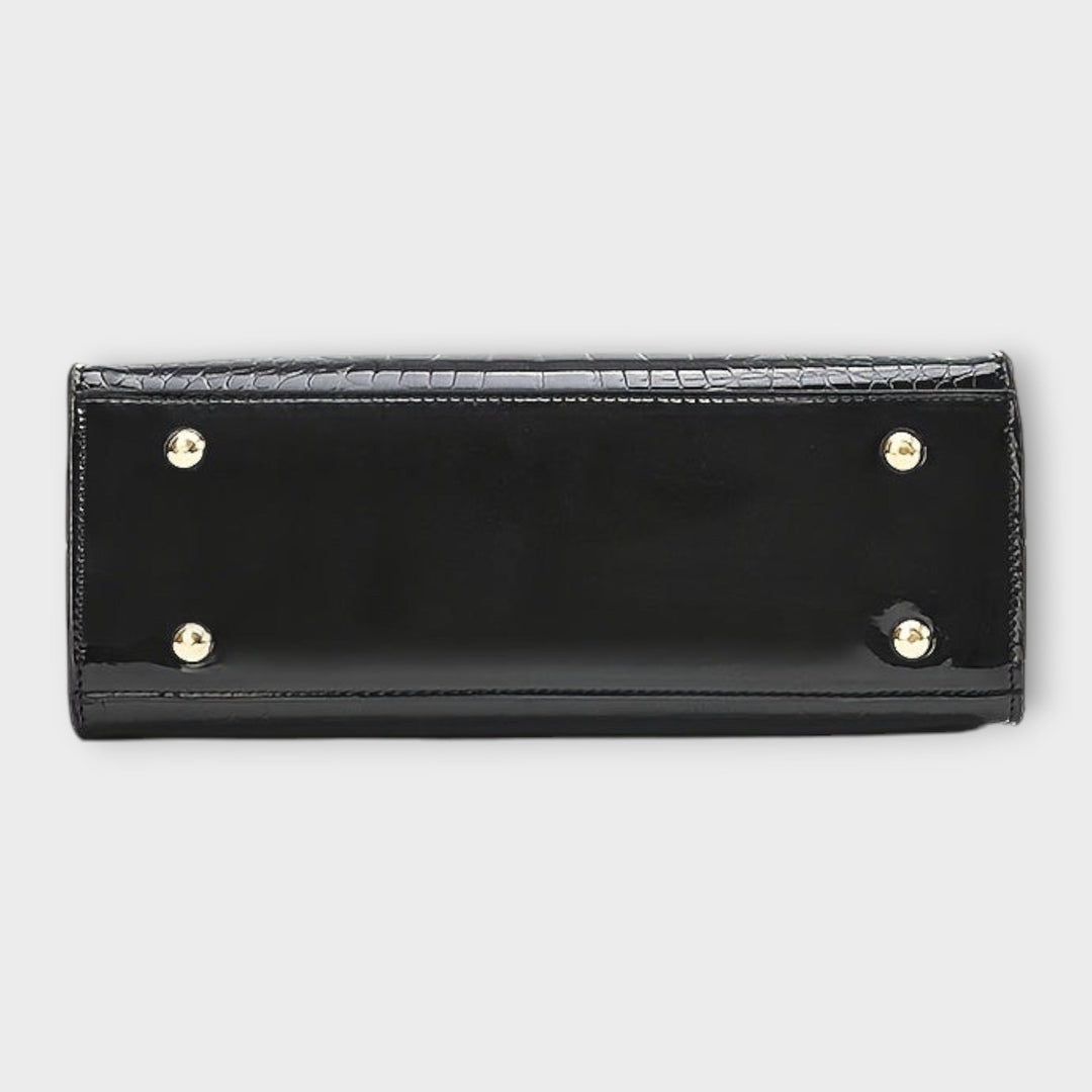 Bolso de mano brillante con estampado de piel de cocodrilo de Laura