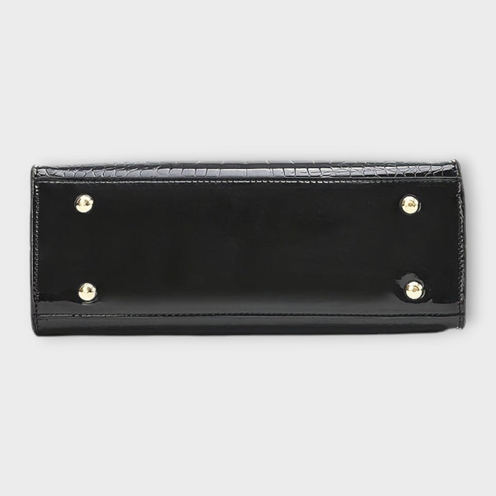 Bolso de mano brillante con estampado de piel de cocodrilo de Laura