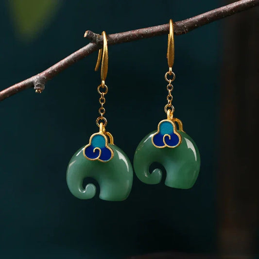 Pendientes de elefante verdes retro de lujo