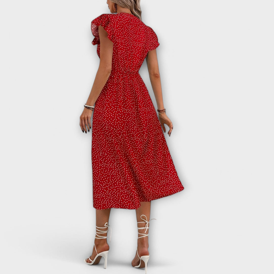 Vestido midi elegante con puntos de lunares