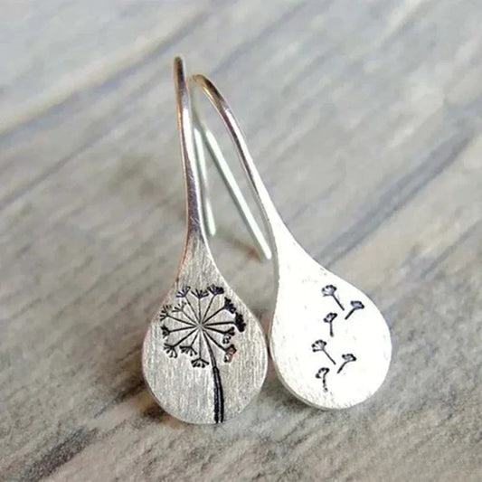Pendientes Dandy León diseñados en color plata