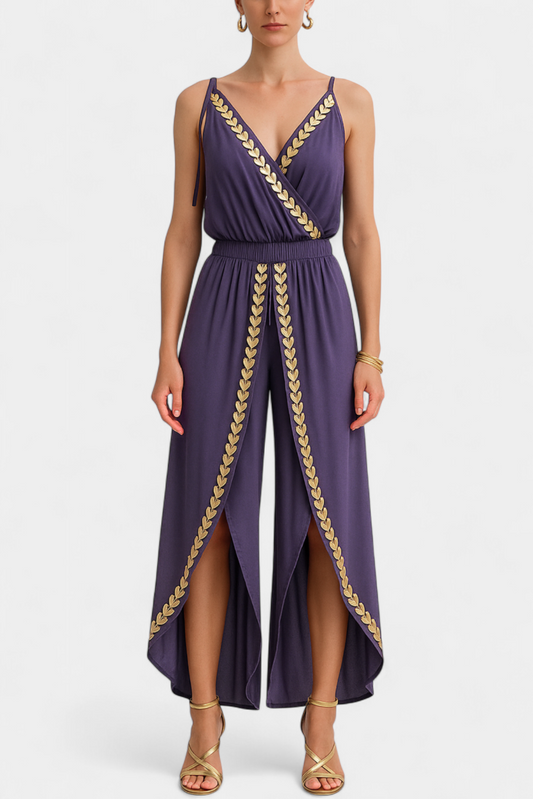 Saria – Vestido tipo jumpsuit con detalles dorados y cortes en las piernas