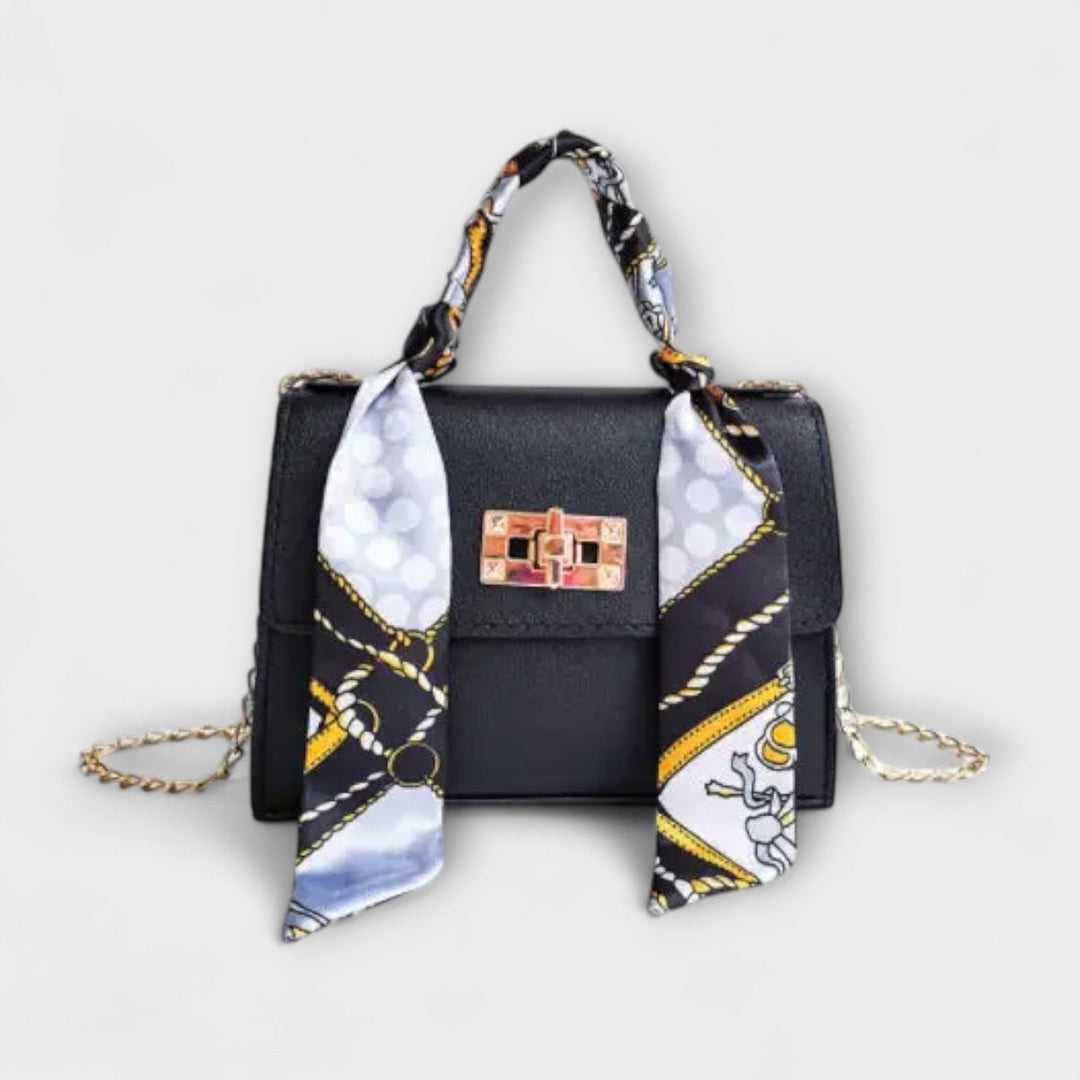 Bolso de mano de cuero marrón elegante con cierre dorado