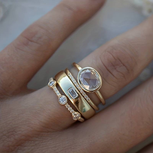 Conjunto de anillos de oro vintage con piedras de circonio